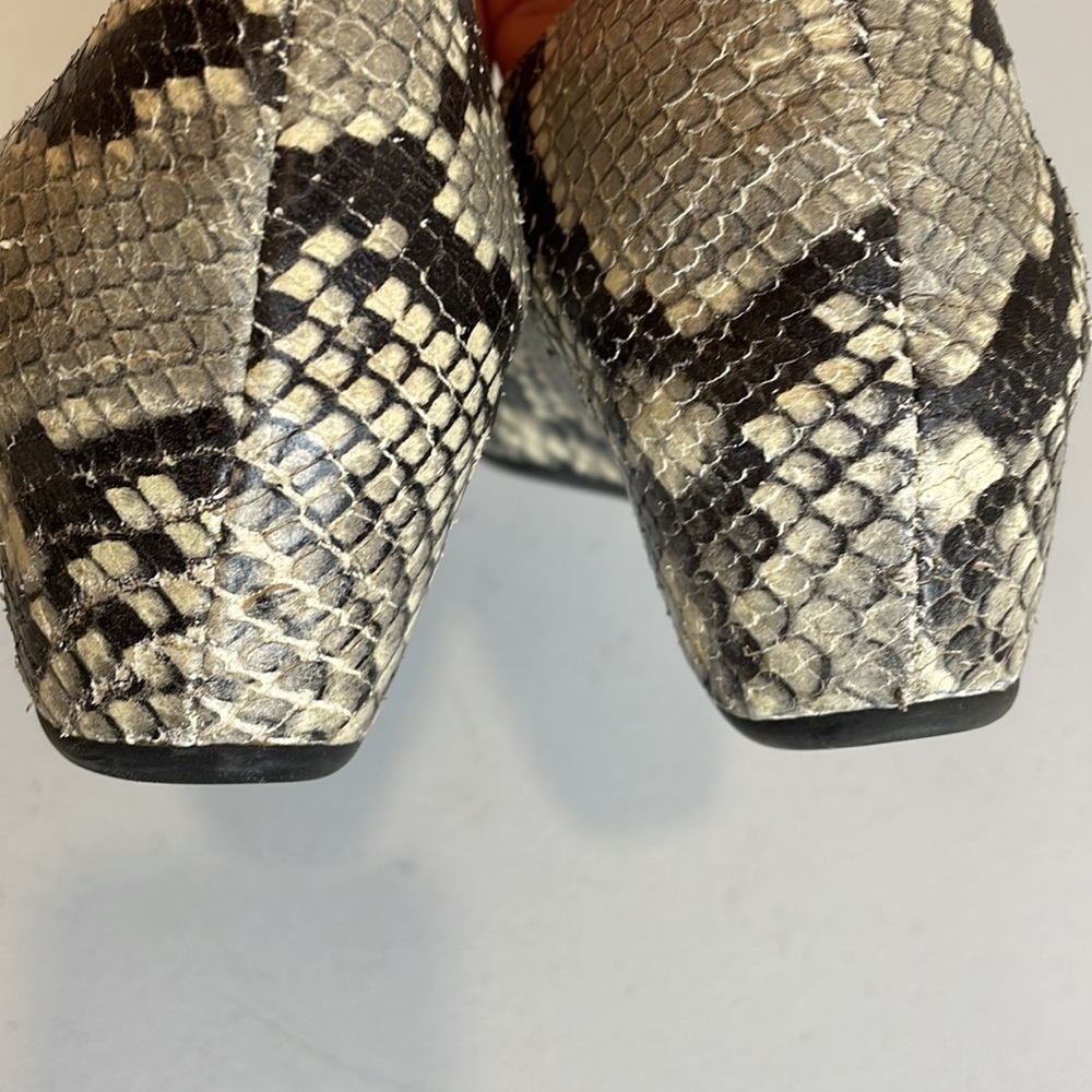 snakeskin wedge booties